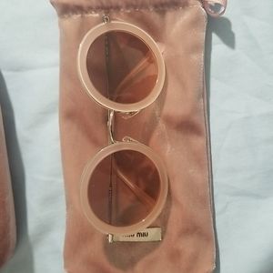 MIU MIU pink round sunglasses